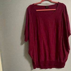 Pink, large sleeve three-quarter length sweater. Light fabric
